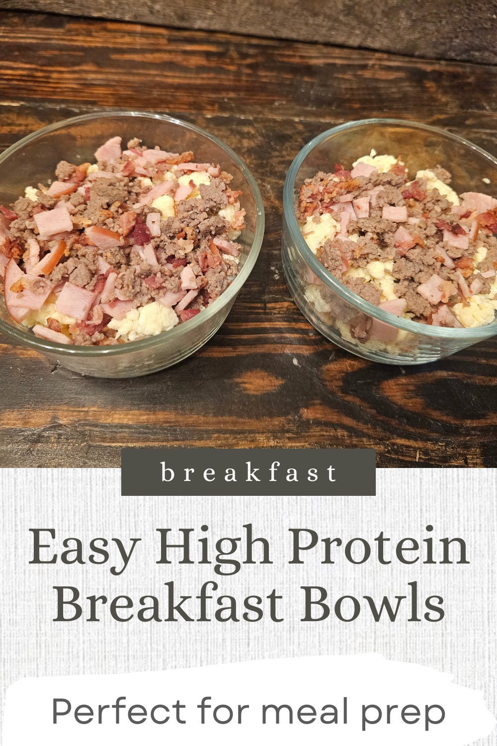 High protein breakfast bowl with eggs, cottage cheese, Canadian bacon, turkey sausage, bacon pieces, vegetables, and reduced-fat cheese.